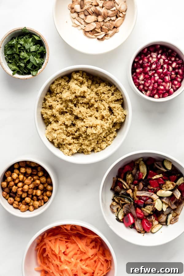 A flat lay photograph showcasing all the fresh and colorful ingredients ready to be combined for the Moroccan quinoa salad.