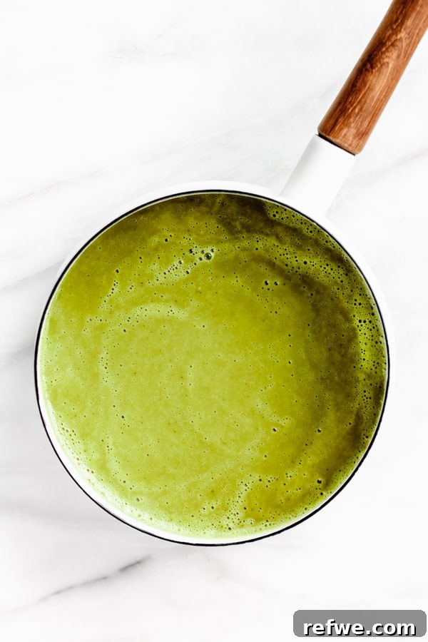 Vibrant Green Detox Elixir 6 detox soup recipe simmering in a pot