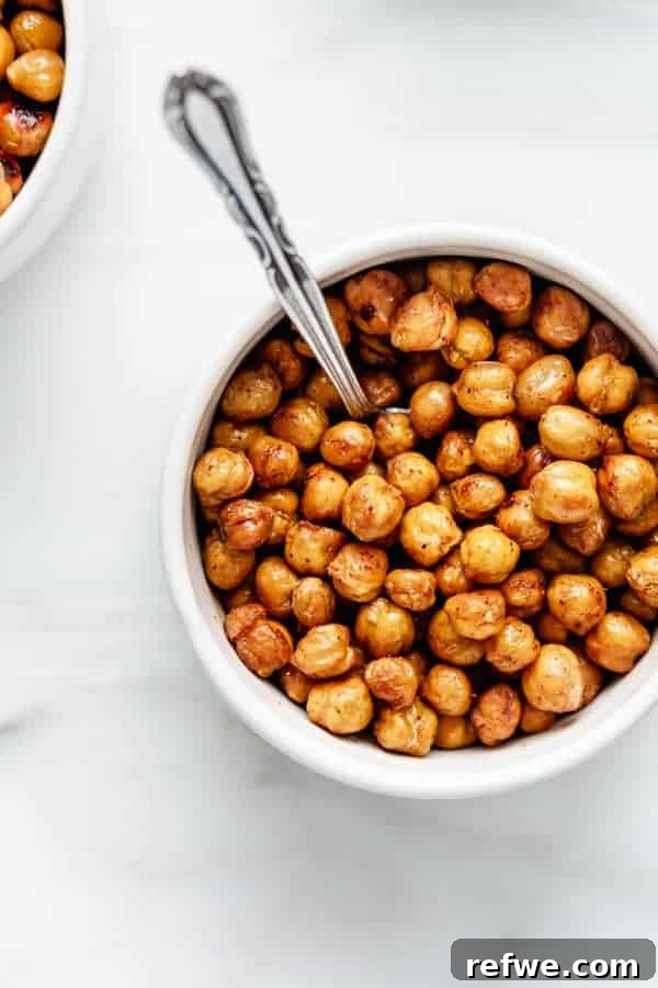 Roasted Chickpea Remix: Three Flavorful Variations 2 A bowl of freshly roasted chickpeas, showcasing their crispy texture and delicious seasoning.