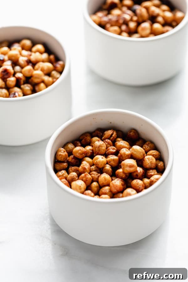 Roasted Chickpea Remix: Three Flavorful Variations 6 Three small bowls showcasing the different flavors of roasted chickpeas: spicy, sweet and salty, and chili lime.