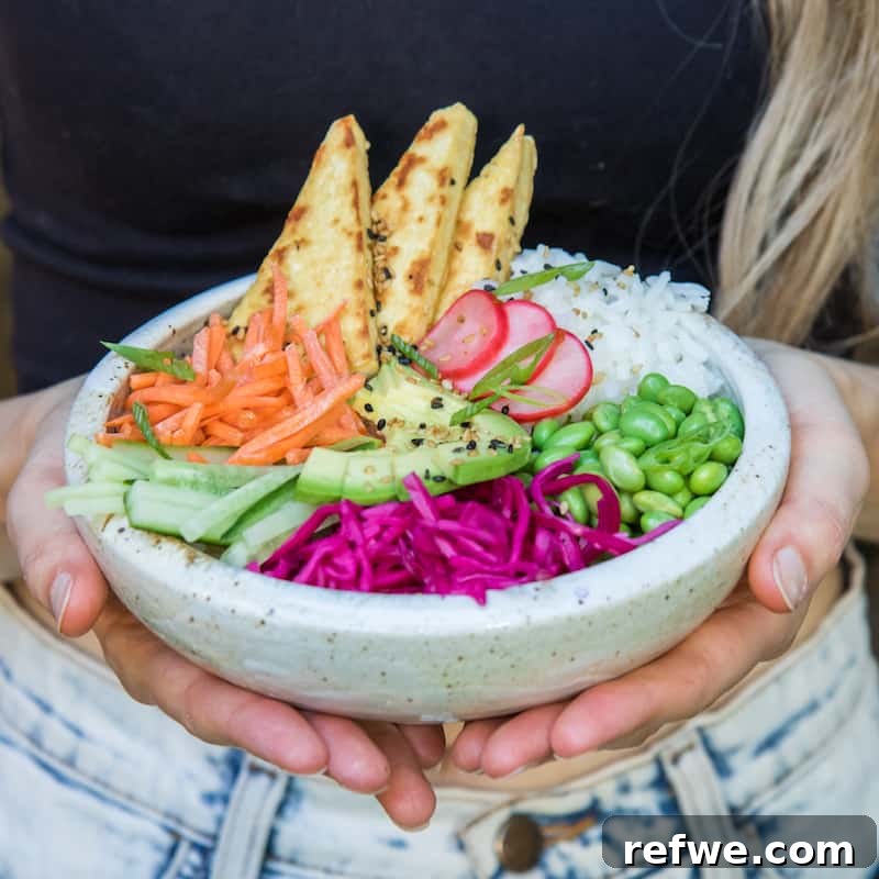 Finished coconut jasmine rice with sesame tofu Buddha bowl from above