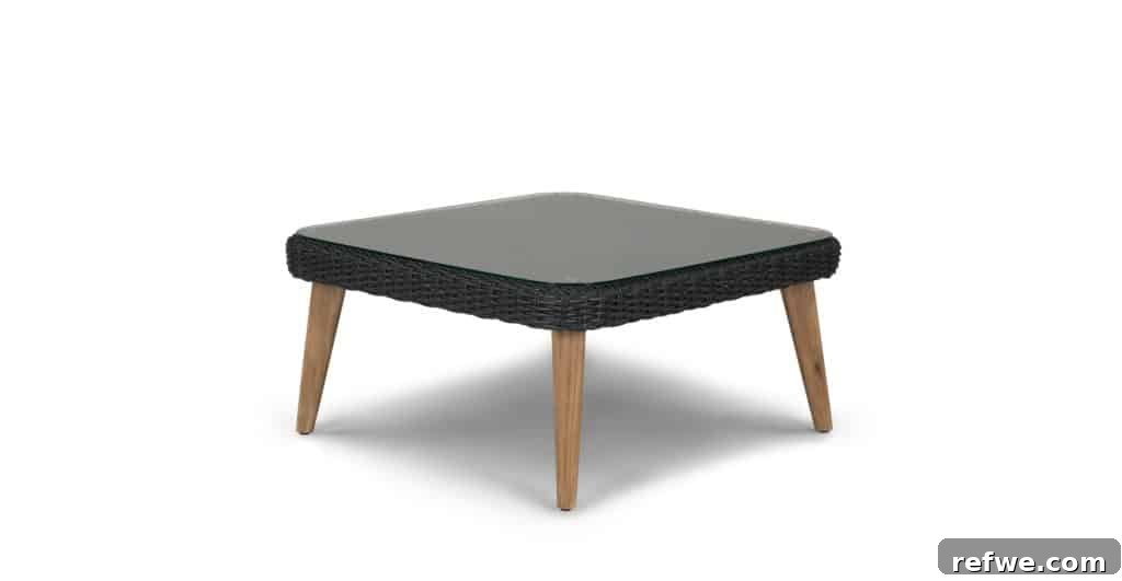 5 Ways to Spruce Up Your Patio for Memorial Day Savings 8 Ora Slate Gray Coffee Table, a minimalist and functional outdoor accessory.
