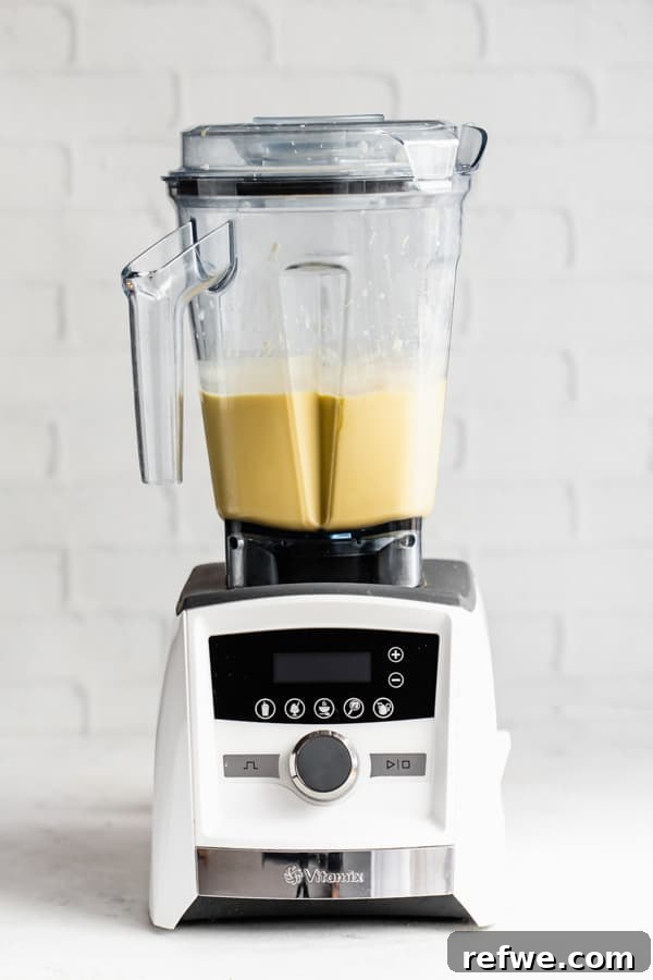 a vitamix with vegan mango lassi inside