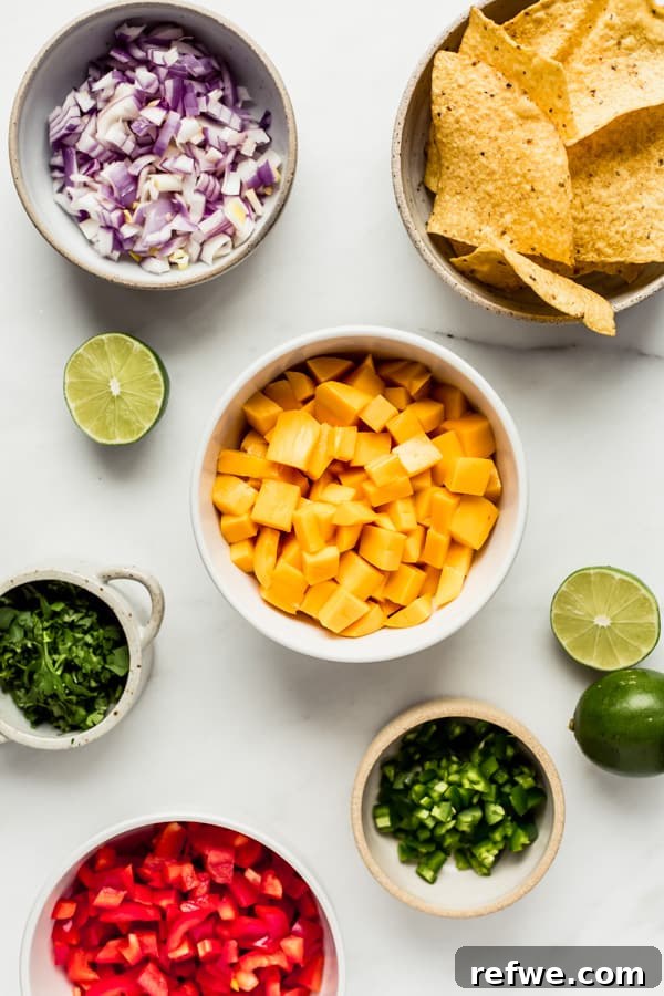 Ferah ve Pratik Mango Salsa 3 Finely chopped ingredients for mango salsa arranged in separate bowls, ready for mixing.