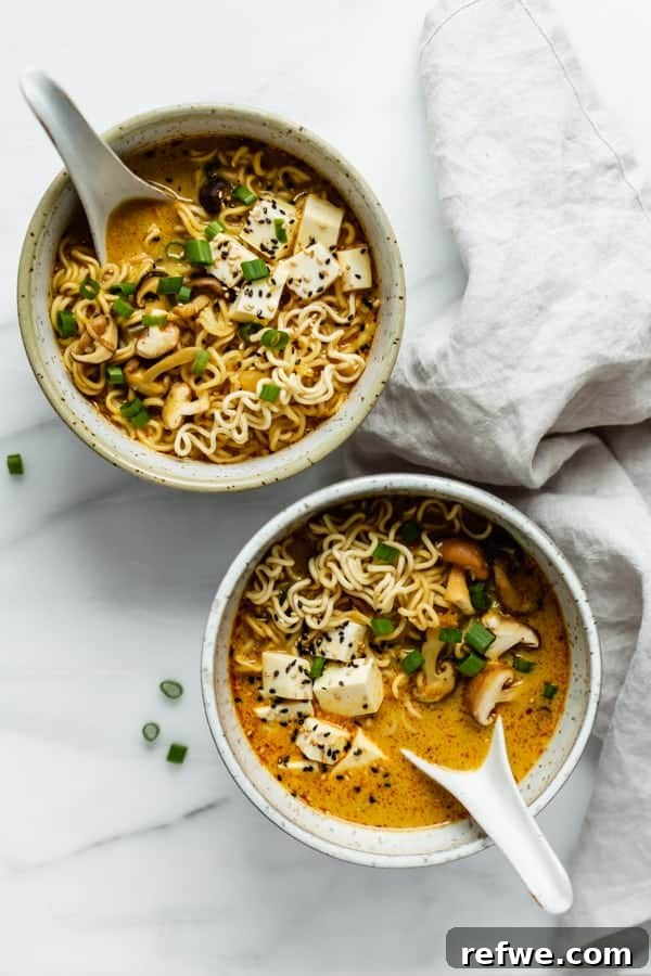 25 Delicious Vegan Dinners Made Easy 12 A steaming bowl of Spicy Thai Vegan Ramen, rich with noodles and vegetables