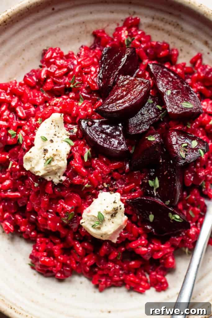 25 Delicious Vegan Dinners Made Easy 18 Vibrant pink Vegan Beet Risotto topped with a dollop of vegan ricotta cheese
