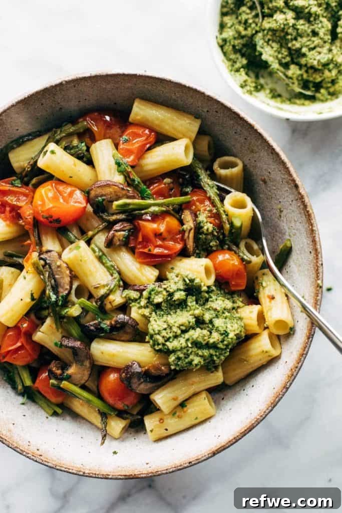 25 Delicious Vegan Dinners Made Easy 22 Fresh Farmers’ Market Pasta with vibrant walnut pesto and various vegetables