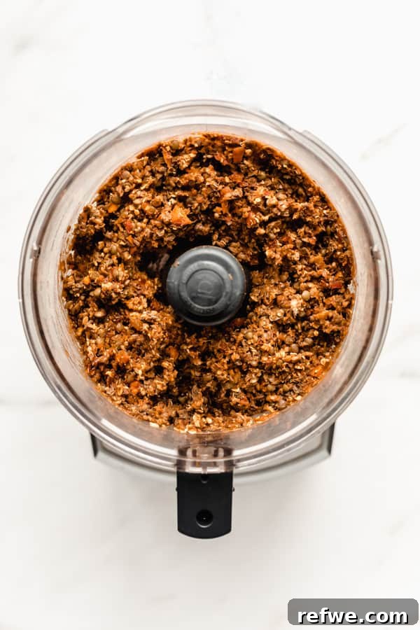 Comforting Plant-Based Lentil Loaf 4 a food processor with lentil loaf mixture in it