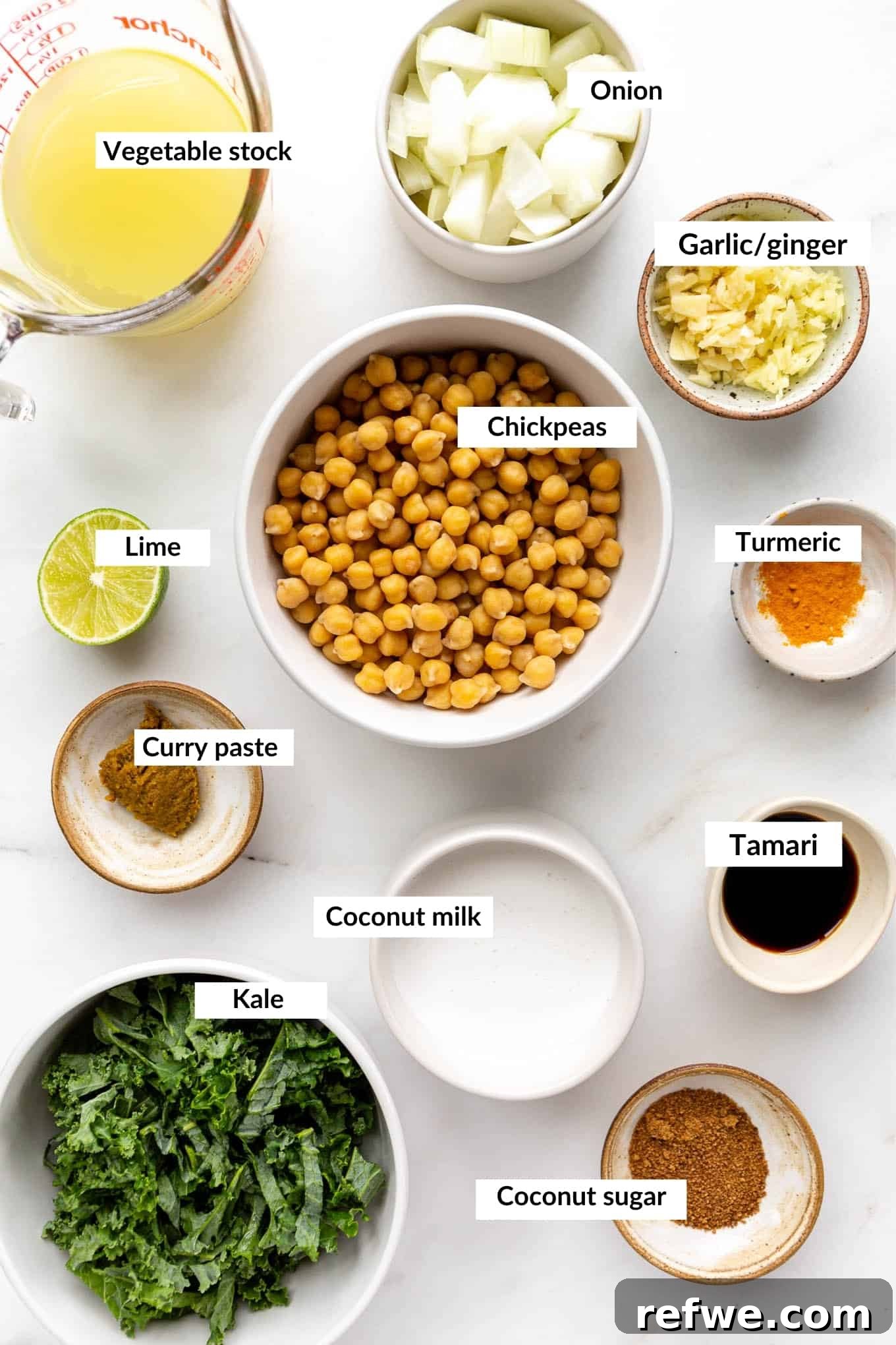 Creamy Coconut Chickpea Stew 3 A flat lay photograph showcasing all the fresh and colorful ingredients needed to prepare a delicious coconut chickpea curry.