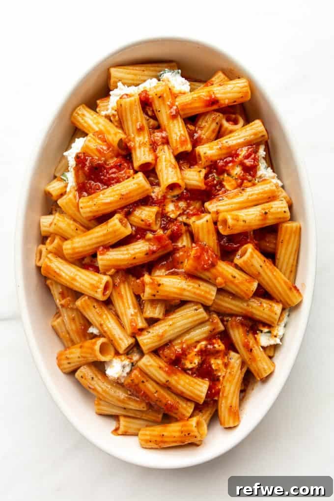 Rich Ricotta Vegetarian Ziti Bake 11 baked ziti noodles covered in sauce in a baking dish