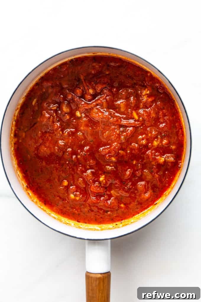 Rich Ricotta Vegetarian Ziti Bake 4 tomato sauce in a white pot