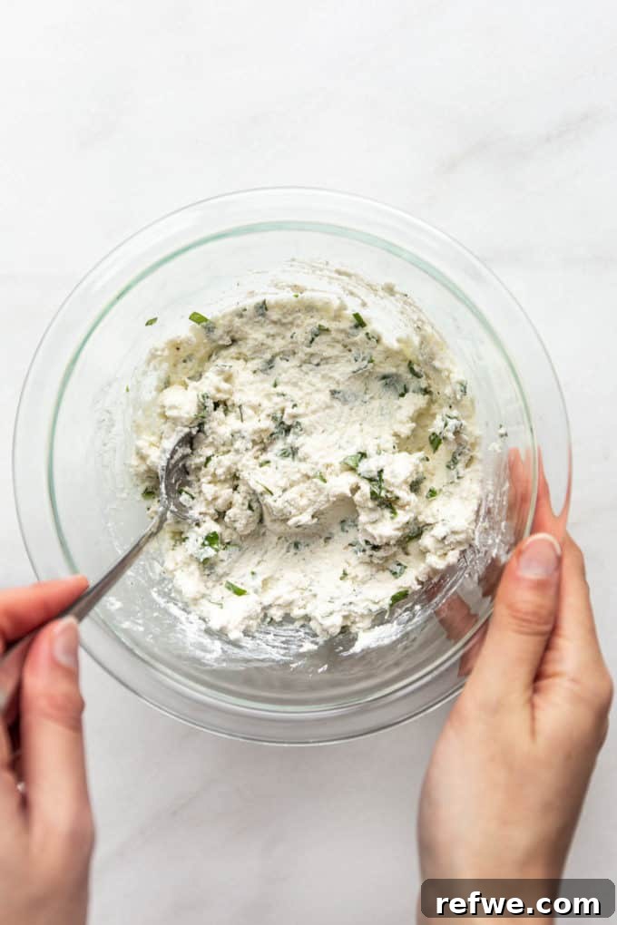 Rich Ricotta Vegetarian Ziti Bake 6 ricotta filling mixed up in a clear bowl