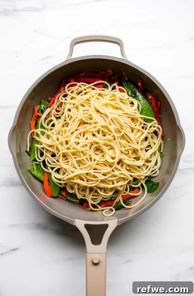 Quick Healthy Vegetable Lo Mein 7 A pan with noodles and vegetables in it