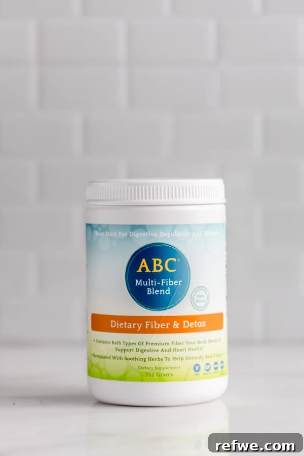 Portable Oat Cups 3 A bottle of Nutritional Brand ABC Multi-Fiber Blend, highlighting its natural and beneficial ingredients.