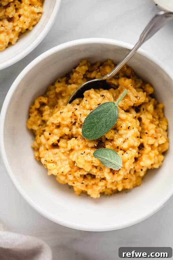 Effortless Elegance: 20 Stunning Date Night Dinners 3 Creamy roasted butternut squash risotto, garnished with fresh sage and black pepper, served in a white bowl with a silver spoon, perfect for a cozy date night.