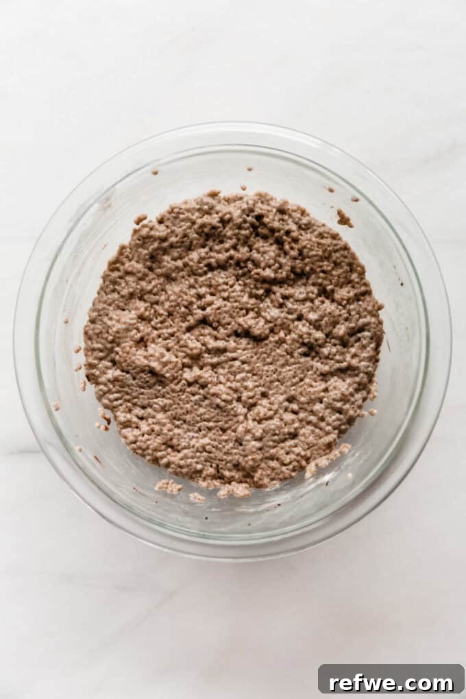 Spiced Chai Chia Dream 6 A bowl of perfectly set chai latte chia pudding, demonstrating the ideal thick and creamy consistency after refrigeration.