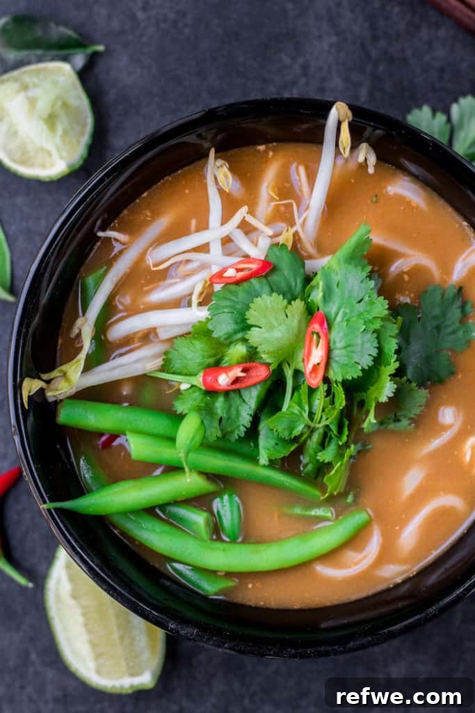 No-Fuss Tom Yum Soup 3 Closeup of fresh ingredients for Tom Yum soup: lemongrass stalks, kaffir lime leaves, and galangal ginger.