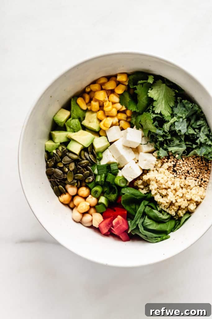 Vibrant Green Goddess Quinoa Bowl 5 Close-up of a quinoa power bowl with colorful vegetables and feta