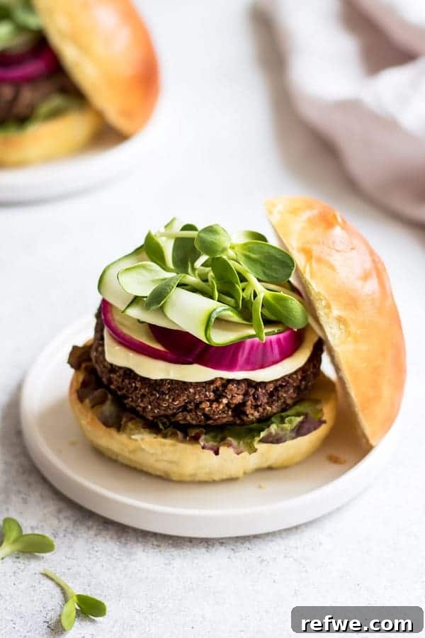 21 Amazing Meals from a Single Can of Beans 2 A delicious and hearty vegan black bean quinoa burger on a plate