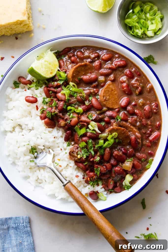21 Amazing Meals from a Single Can of Beans 5 A savory bowl of Instant Pot Red Beans and Rice with fresh herbs