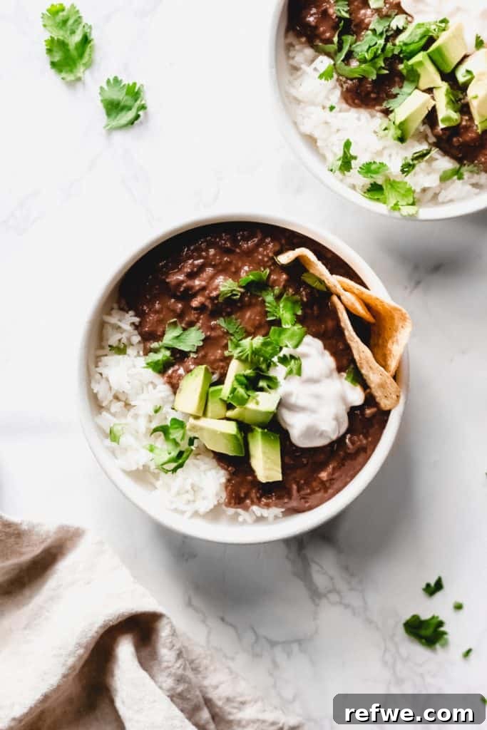 21 Amazing Meals from a Single Can of Beans 9 A rich and creamy vegan slow cooker black bean soup, ready to be enjoyed