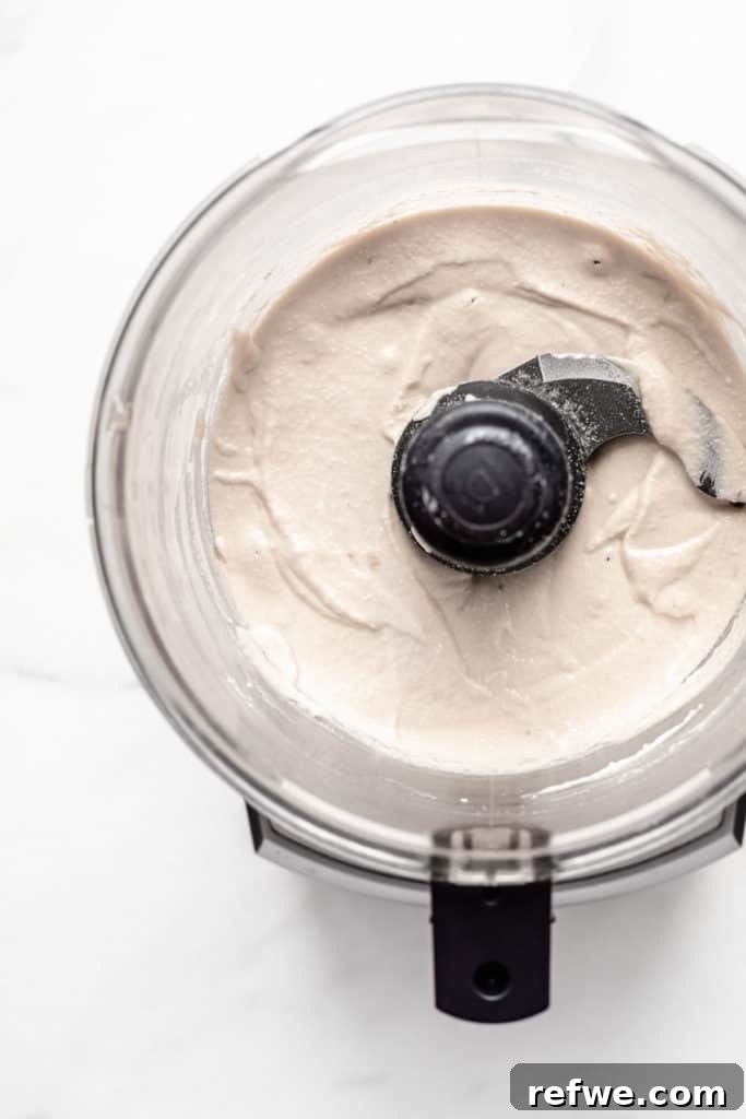 Guilt-Free Raw Vegan Carrot Cake 8 raw cashew cream in a food processor