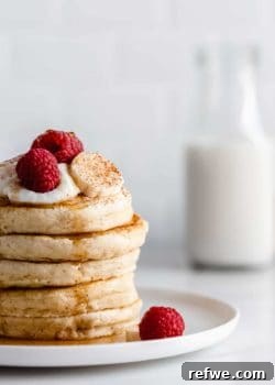 A close up view of a stack of pancakes