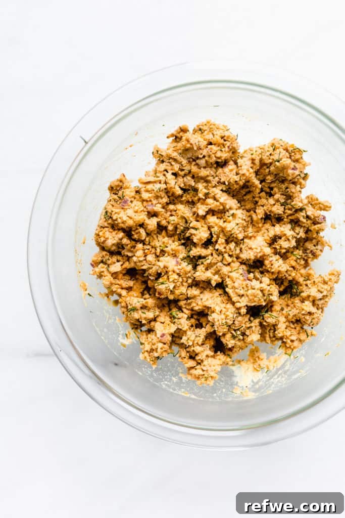 a bowl of smashed chickpea salad