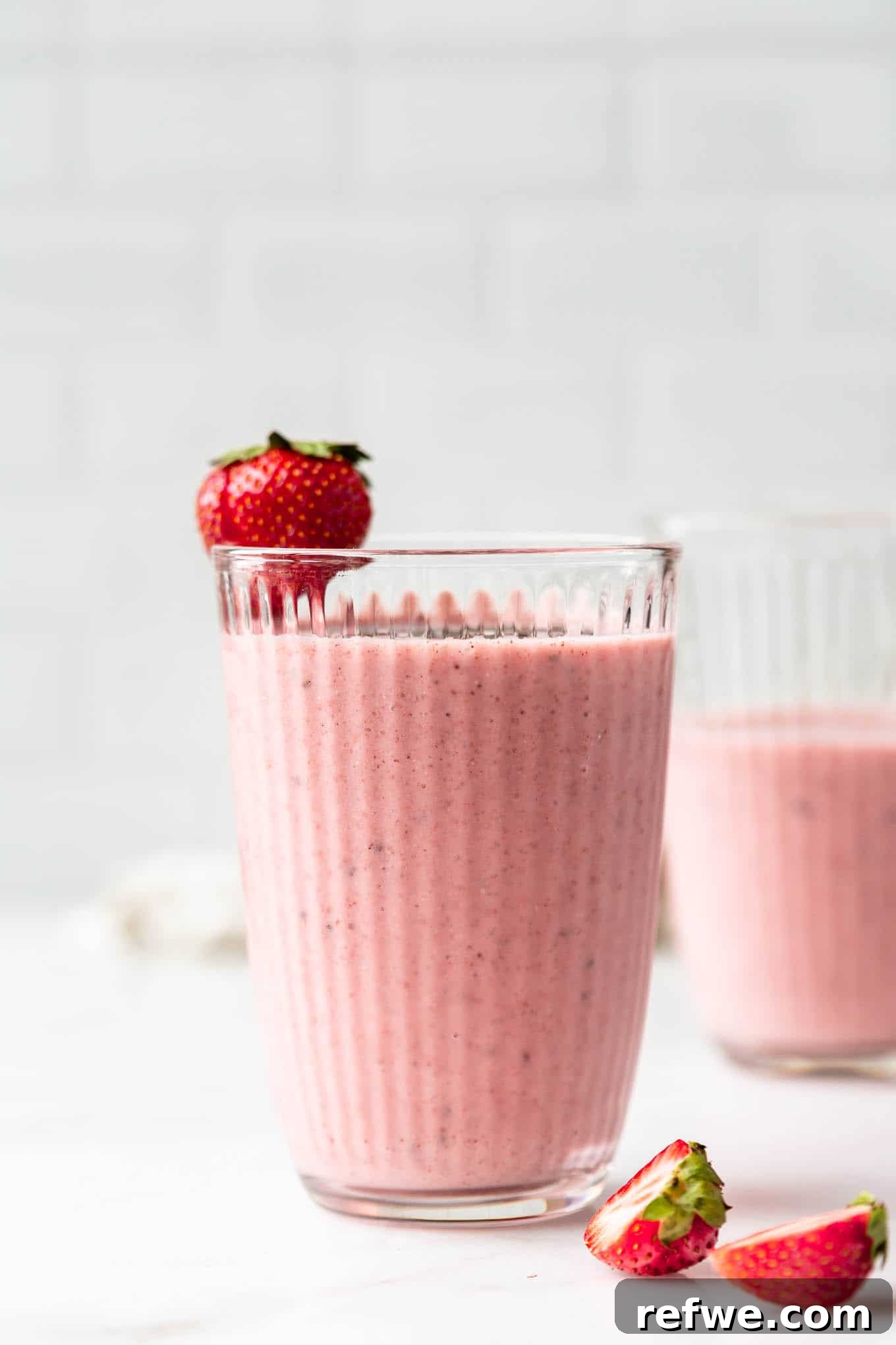 23 Simple Wholesome Morning Smoothies 21 A strawberry chia seed smoothie in a glass
