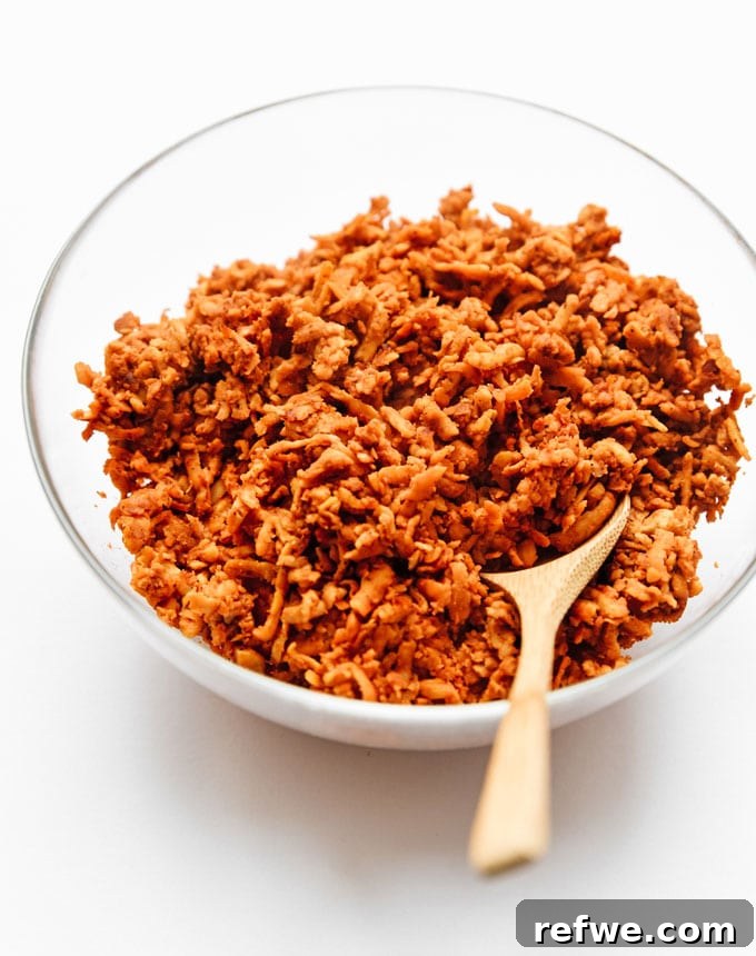Unlock Tempeh's Potential 23 Recipes and a Full Cooking Guide 16 A mixing bowl filled with perfectly seasoned Tempeh Taco Meat, ready to be used in tacos, burritos, or bowls.