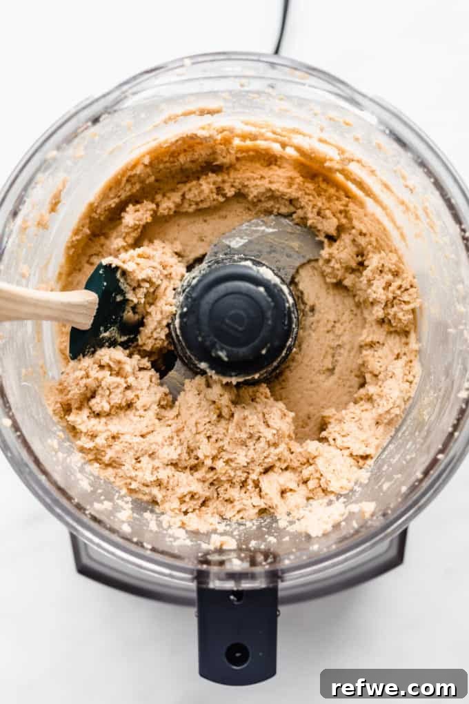 Creamy Almond Chickpea Cookie Dough 4 blended chickpea cookie dough in a food processor