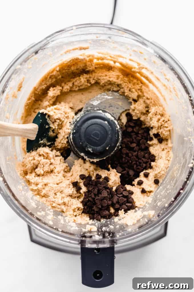 Creamy Almond Chickpea Cookie Dough 5 chickpea cookie dough and chococlate chips in a food processor