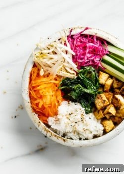 A small, colorful image of a Vegan Bibimbap bowl for the recipe card.