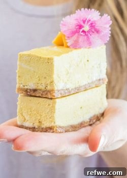 Vibrant Vegan Mango Cheesecake Bars, a refreshing tropical dessert.