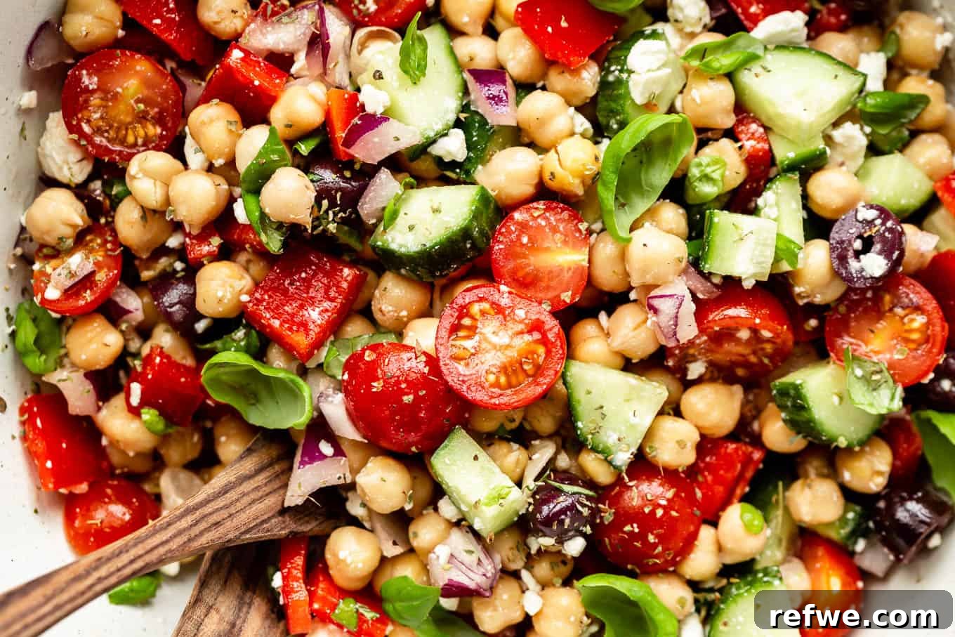 Vibrant Mediterranean Chickpea Salad 9 Chickpeas, tomatoes and cucumbers expertly tossed together with the dressing