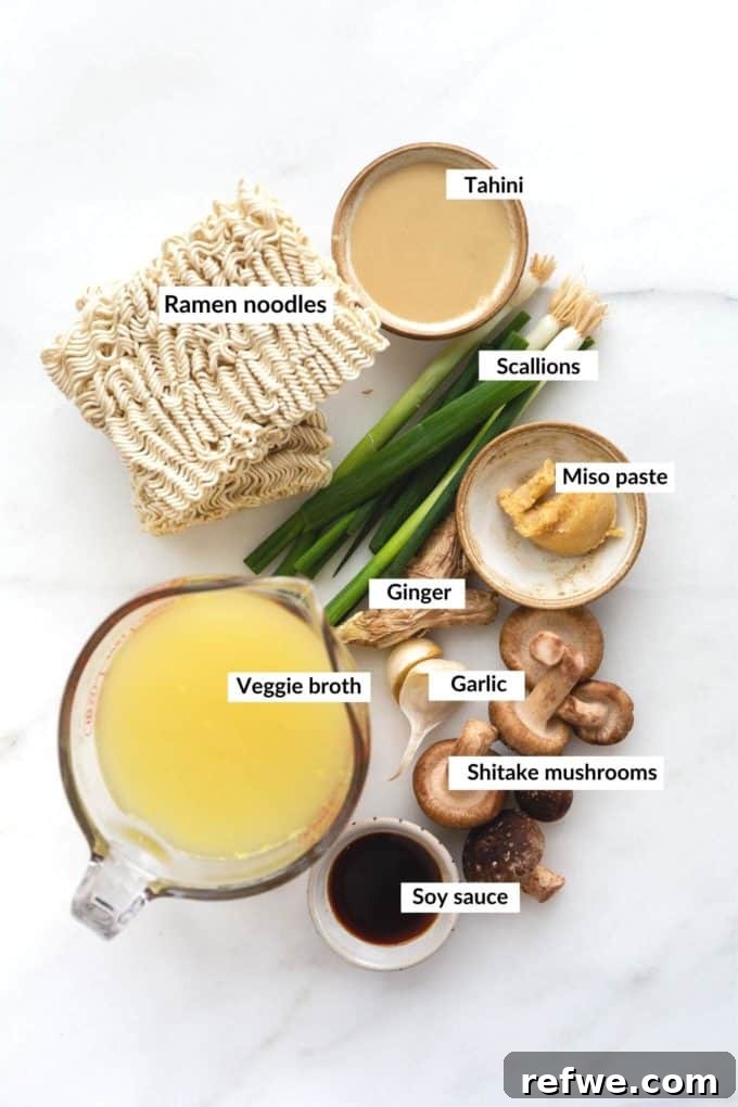 Whip Up Miso Ramen in 15 Minutes 4 A flat lay of fresh ingredients for miso ramen including ramen noodles, shiitake mushrooms, scallions, ginger, garlic, miso paste, tahini, and tofu.