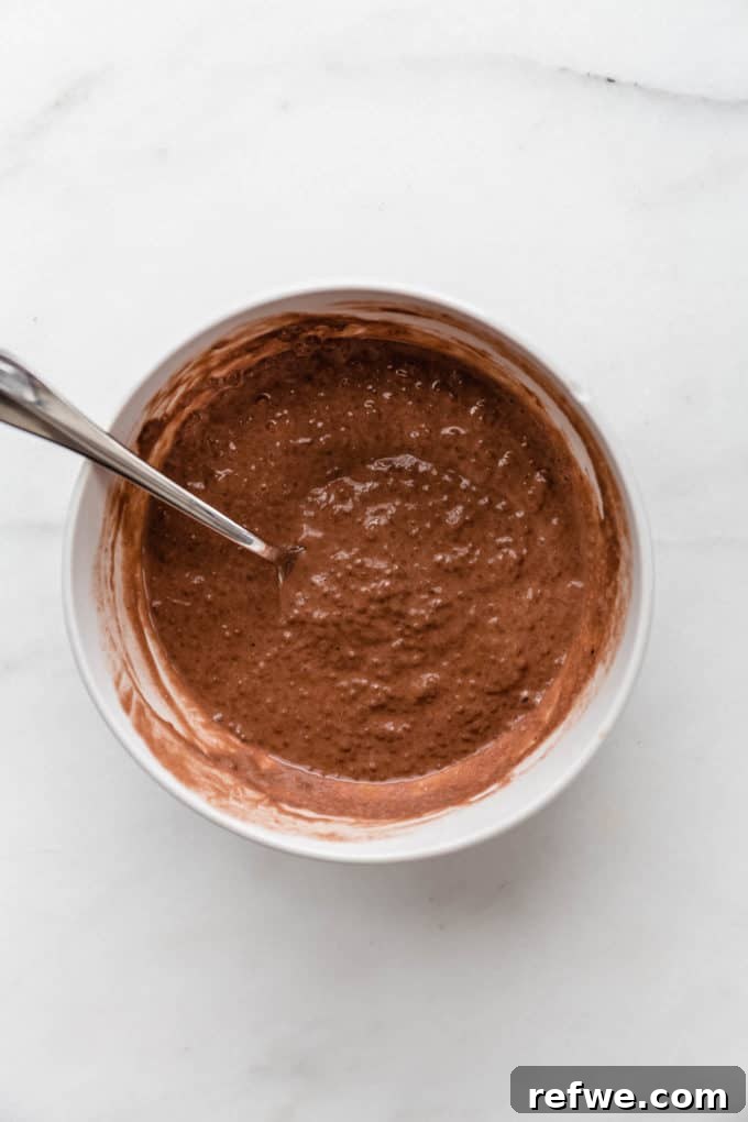 Decadent Tiramisu Chia Pudding 4 A bowl of creamy, set chocolate chia pudding, ready for layering.