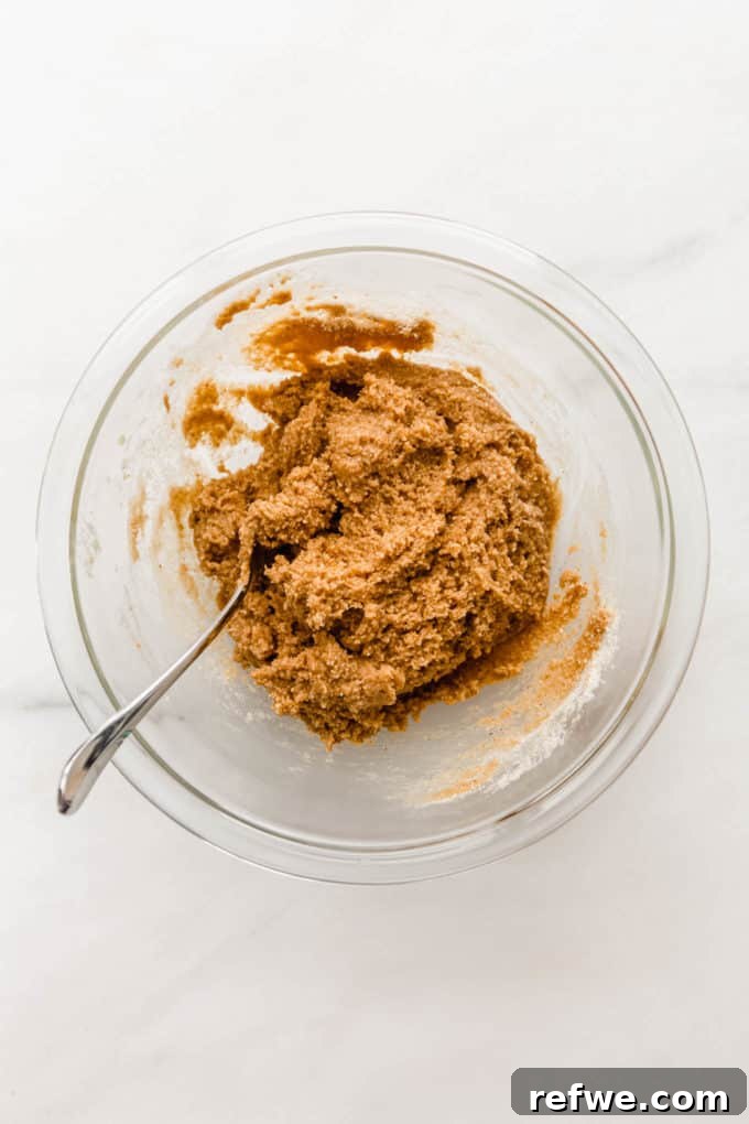 Irresistible Vegan Peanut Butter Treats 4 Smooth vegan peanut butter cookie dough in a clear mixing bowl after all ingredients are combined and chilling.