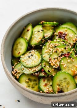 Asian cucumber salad topped with sesame seeds