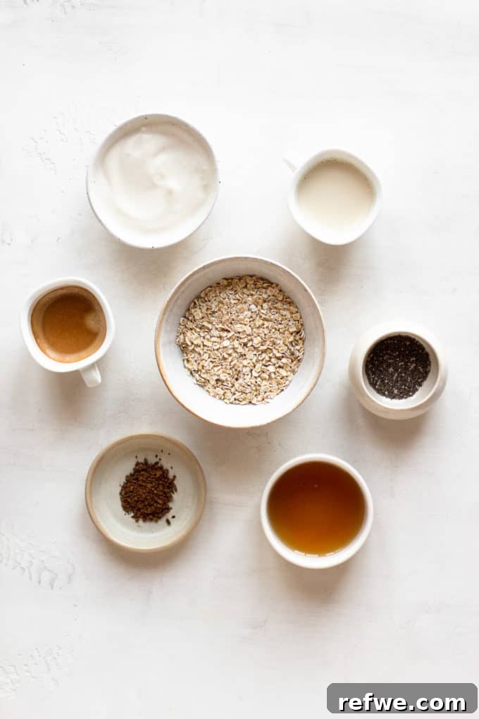 Java Overnight Oats 3 A selection of fresh ingredients carefully laid out to prepare delicious coffee overnight oats, including oats, coffee, milk, and sweeteners.