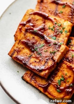 A close up of a piece of barbecue tofu