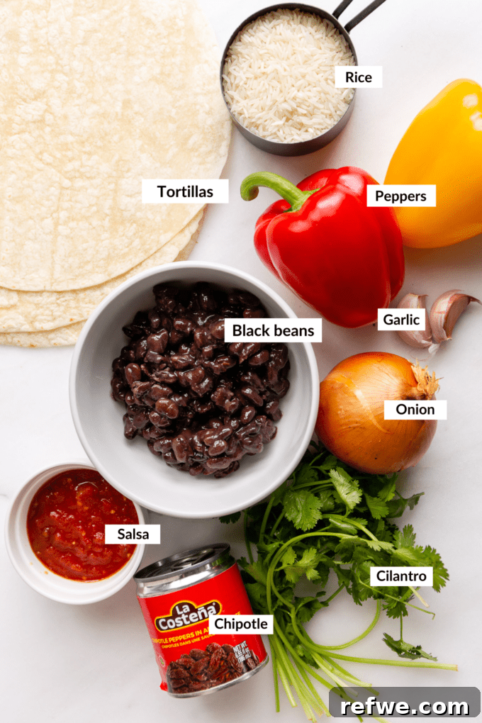 A colorful array of fresh ingredients laid out on a kitchen counter, including black beans, bell peppers, onions, cilantro, lime, and tortillas, essential for making delicious veggie burritos.