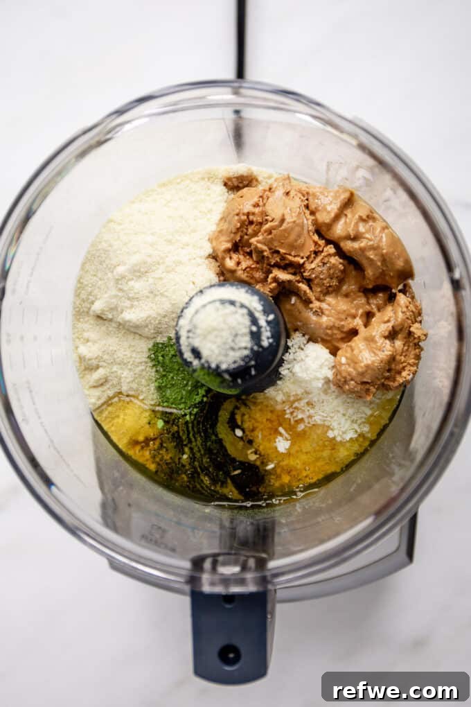 Zen Matcha Fuel Bites 3 almond flour, matcha, honey, coconut and cashew butter in a food processor, ready to be blended