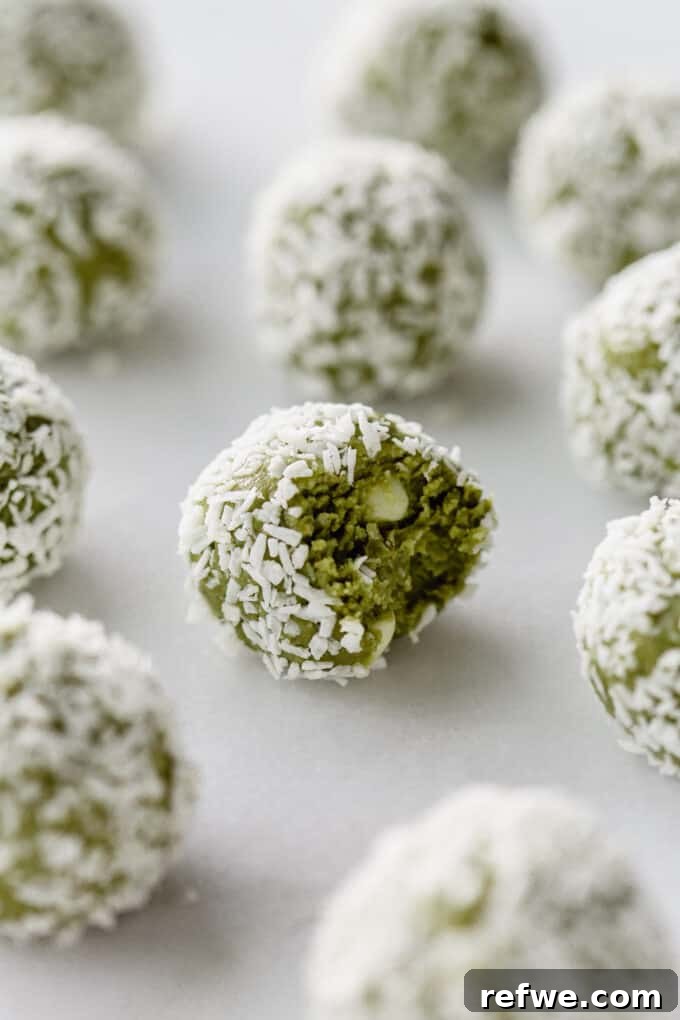 Zen Matcha Fuel Bites 9 matcha bites on a marble counter, elegantly arranged and ready to be enjoyed