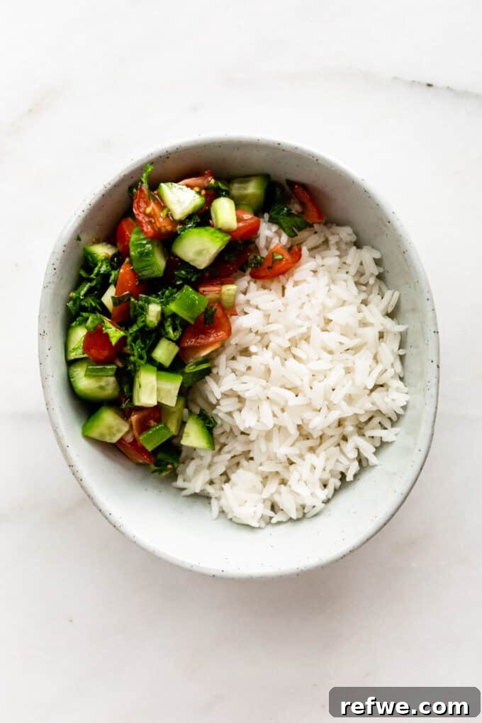 Quick Oven-Baked Falafel Bowls 9 Fluffy rice and fresh Israeli salad layered in a bowl