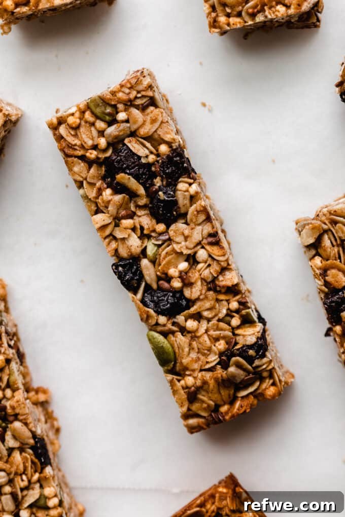 Nourishing Homemade Granola Bars 12 a granola bar with dried fruit and seeds