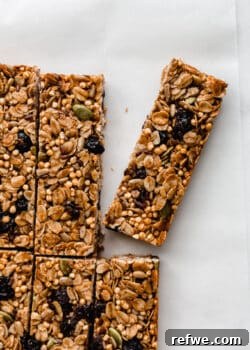 sliced homemade granola bars on parchment paper