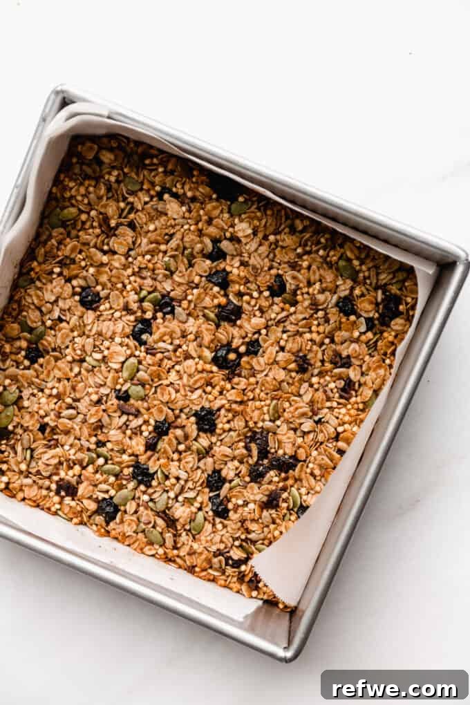 Nourishing Homemade Granola Bars 10 unbaked granola bars in a pan