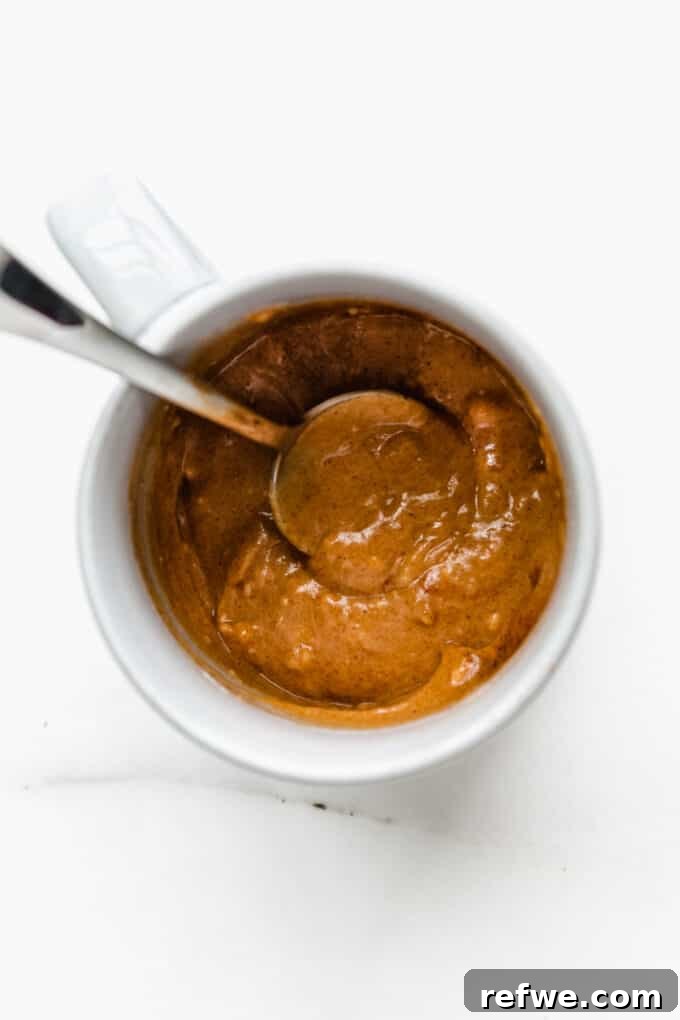 Warm Pumpkin Spice Mug Bliss 5 Smooth pumpkin mug cake batter ready for the microwave