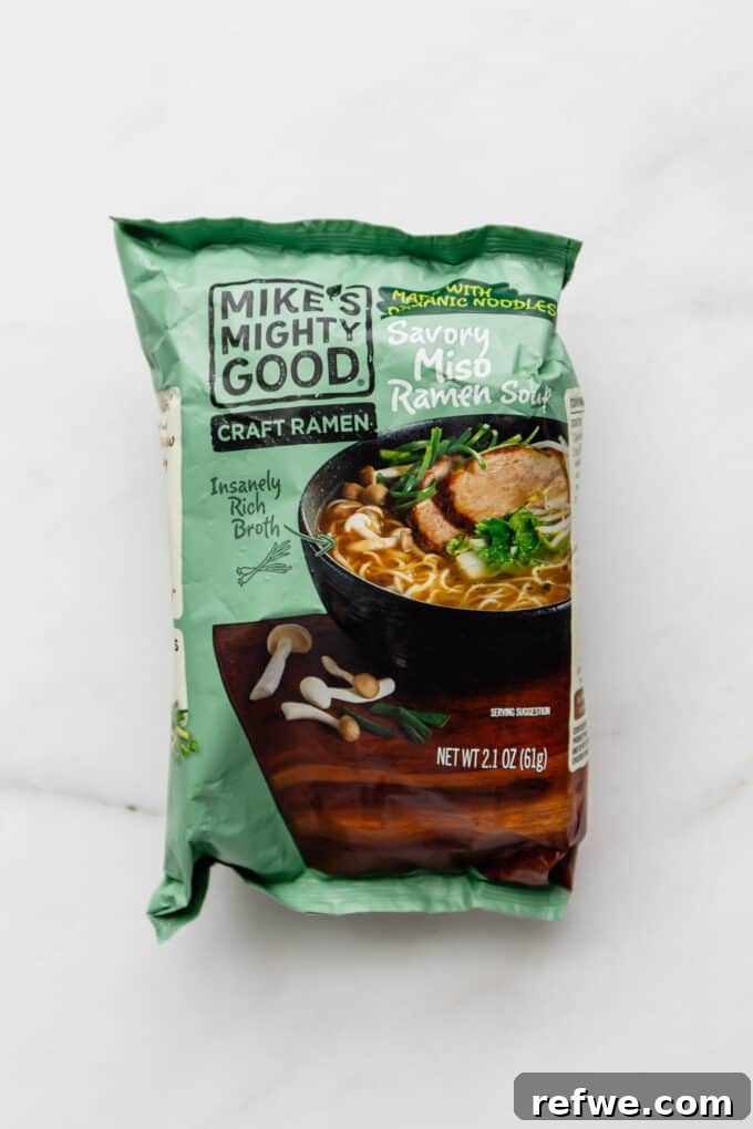 A close-up shot of a Mike's Mighty Good ramen noodle package, highlighting its organic and natural ingredients, promising a quality meal.